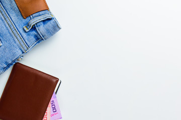 Travel accessories costumes concept for summer vacation trip. Passports, luggage, map, smartphone,sun glasses,camera, note pad, jean on white