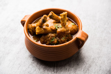 Hyderabadi Mutton Paya, Nehari, nazari or Nihari Masala. served with Naan and rice. selective focus