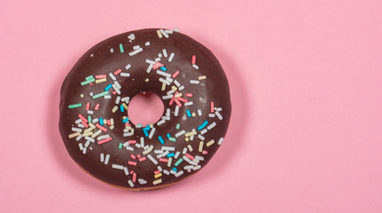 chocolate donut with sugar sprinkles
