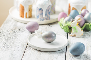 Fototapeta na wymiar Easter table with Easter eggs over white background
