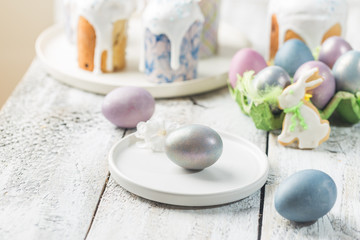 Easter table with Easter eggs over white background