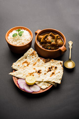 Hyderabadi Mutton Paya, Nehari, nazari or Nihari Masala. served with Naan and rice. selective focus