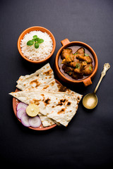 Hyderabadi Mutton Paya, Nehari, nazari or Nihari Masala. served with Naan and rice. selective focus
