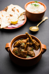 Hyderabadi Mutton Paya, Nehari, nazari or Nihari Masala. served with Naan and rice. selective focus