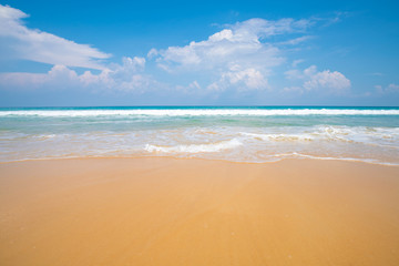 Beautiful clear sea beach white sand against blue sky with cloud