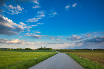 Country road thru rural Bavaria in Germany