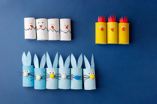 Collection of toys from toilet roll tube for Happy easter decor. A terrible craft. School and kindergarten. Handcraft creative idea, seasonal spring time holiday pattern, knolling, blue