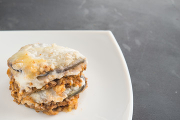 moussaka, eggplant of aubergine. In black background
