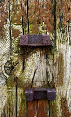 Close-up detail of weathered wooden fence post
