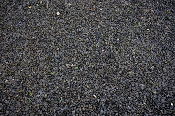 Black wet gravel