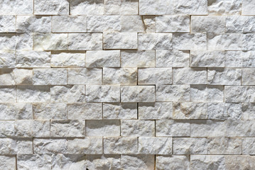 White natural quartz in the blocks for decorating walls indoors.