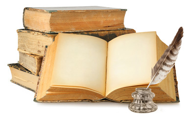 Isolated old books. Open book with empty pages, stack of old books and inkwell isolated on white...