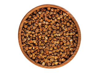 Buckwheat in a wooden Cup on a white background