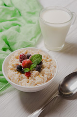 Healthy oatmeal with fruits is the best choice for breakfast.