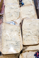 Gorgonzola cheese, a veined Italian blue cheese, made from unskimmed cow's milk. It can be buttery or firm, crumbly and quite salty