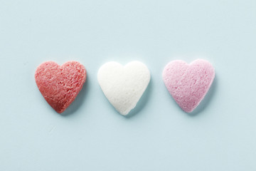 Decorative hearts on a blue background. Valentine's day decor concept. February 14