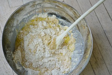 Making the flour and water yeast dough in a bowl for miracle overnight no knead bread