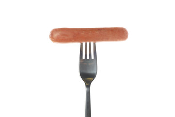 Fork with sausage isolated on white background