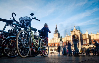 Naklejka na ściany i meble Bottom view of bicycle parking on the background of Krakow square