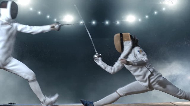 Two fencing athletes fight on professional sports arena.