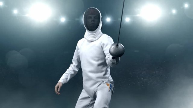 Two fencing athletes fight on professional sports arena.