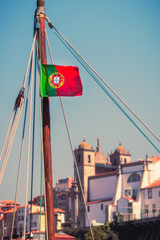 Flag of Portugal on a boat in the port of Porto