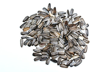 Sunflower seeds isolated on white background, top view
