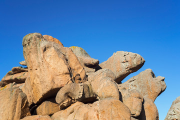 Strange rock formations and water / wind eroded boulders along the Côte de granit rose / Pink...