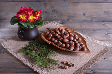 nuts and flowers on the table.