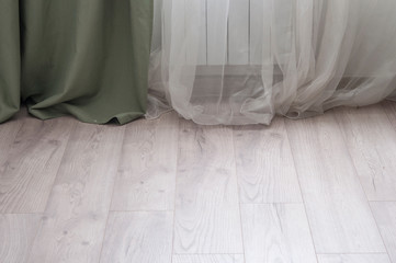  wooden floor, curtains and tulle