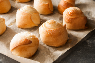 Homemade buns from the oven on a baking sheet