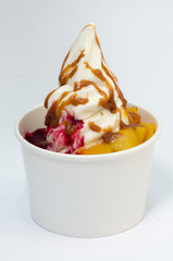  glass of ice cream, with chopped fruits and sauces