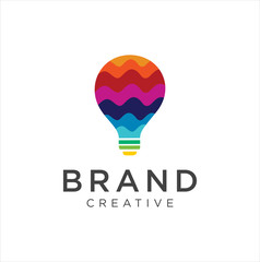 Bulb Logo Design Colorfull . Idea creative light bulb logo . Smart bulb tech logo icon . Bulb digital logo technology Idea