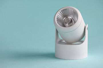 Close-up of electric white lamp. Indoor or outdoor decorative element. Energy saving light bulb, led lamp, spotlight. Repair and maintenance of electrical equipment concept