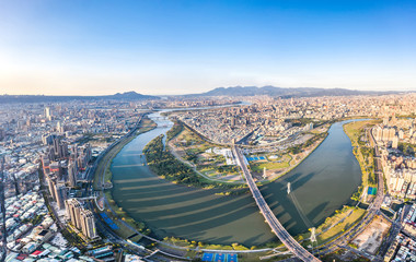 Taipei City Aerial View - Asia business concept image, panoramic modern cityscape building bird’s eye view under daytime and blue sky, shot in Taipei, Taiwan. - obrazy, fototapety, plakaty