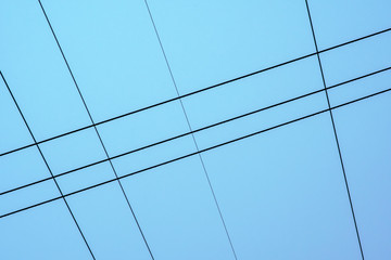 Electrical cable. wires against a blue clear sky