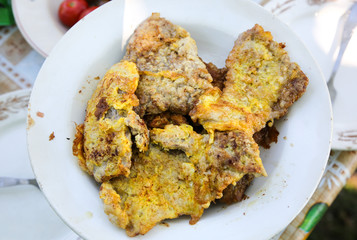 Cutlet meat lying on the plate. Homemade cuisine.