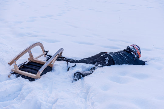 sledding in the snow