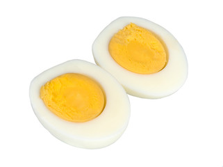 Two halfs of the egg isolated on a white background