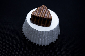 Various of sweet confectionery with chocolate candies and pralines. Handmade chocolates. Realistic chocolate set, delicious dessert pattern.