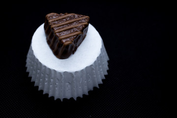 Various of sweet confectionery with chocolate candies and pralines. Handmade chocolates. Realistic chocolate set, delicious dessert pattern.