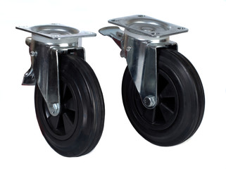Two black rubber wheels with a polypropylene discs in brackets with a brake isolated on white