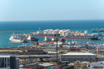 Obraz premium Cape Town docks. December 2019. An overview of Cape Town port and docks area looking to Table Bay harbour and the west coast.
