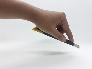 Vintage and Used Rusty Cutter Knife in White Isolated Background