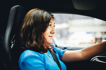 pretty young lady smile and car driving