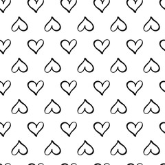 Seamless pattern with red hearts