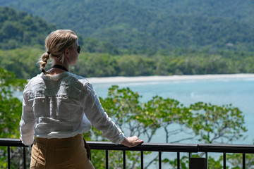 Cape Tribulation Caucasian Woman Overlooking Kulki Beach In Daintree rainforest National Park, Far North Queensland Australia.