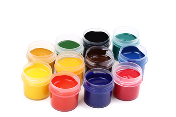 Colorful gouache paints isolated on white background