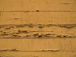Old wooden wall with peeling paint background