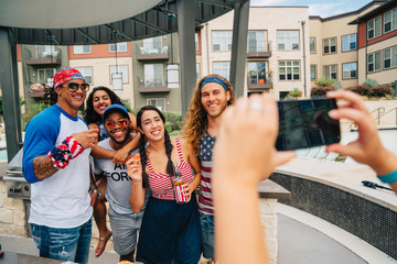 Air Force Veteran and friends having a 4th of July BBQ party at apartment complex. 
